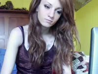 Skinny redhead transsexual teenage newcomer Isabella Shore stroking herself on live cam